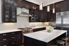 Contemporary Kitchen With Glass Panel Pendant Light Calacatta Carrara Marble Counterto Espresso Kitchen Cabinets Walnut Kitchen Cabinets New Kitchen Cabinets