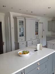 Slate grey floor, white units and walnut worktop. First Class Kitchens Facebook