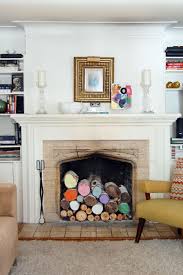 12 Ideas For Decorating A Nonworking Fireplace Unused Fireplace Home Goods Decor Fireplace Decor