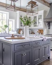 Country Kitchen White Cabinets Gray Center Island White Marble Lantern Pendants Zinc Range Hood Country Kitchen Designs New Kitchen Cabinets Rustic Kitchen