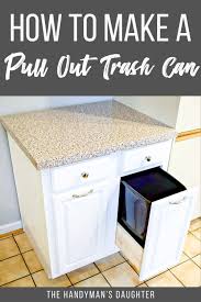 Pull out garbage can in kitchen cabinet. How To Add A Pull Out Trash Can To A Cabinet The Handyman S Daughter