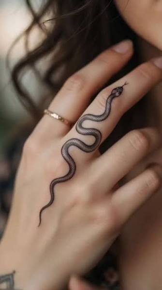 Snake Finger Tattoo • 200+ reels on Instagram