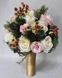 Created by calgary wedding florist: Christmas Winter Wedding Bouquets