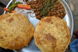 Choley bhature can be eaten in breakfast as well as in lunch. Top 5 Places For Chole Bhature In Delhi Chomp Slurrp Burp