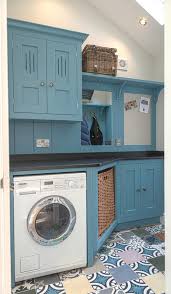 It has long bars where you can hang clothes to dry, plus an optional hinged table that provides a perfect place for folding and sorting clothes. 10 Fresh Design Ideas For A Dream Laundry Room