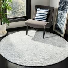 Round jute rugs make perfect kitchen rugs thanks to their natural properties. Round Rugs Joss Main