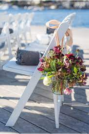 But there are plenty of ideas that go beyond the traditional accents you've probably seen before. Aisle Flowers Pbf Melanie Benson Floral