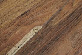 Buckling Laminate Flooring How To Repair A Laminate Flooring Laminate Flooring Flooring Walnut Laminate Flooring