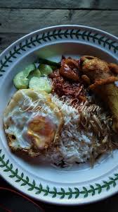 Nasi lemak is a dish originating in malay cuisine that consists of fragrant rice cooked in coconut milk and pandan leaf. Nasi Lemak Kukus Di Cuti Tahun Baru Cina Azie Kitchen
