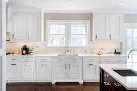 White Kitchen White Cabinets Shaker Satin Nickel Hardware White Counter Medium Wood Floors Needs More Variety With Kitchen Trends Kitchen Minimal Kitchen