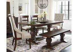 A dining table with benches provides for versatile seating since you can remove the furniture to another room and increase the seating space. Hillcott Dining Table And 4 Chairs And Bench Ashley Furniture Homestore In 2021 Dining Table Rustic Dining Room Table Farmhouse Dining Room Table