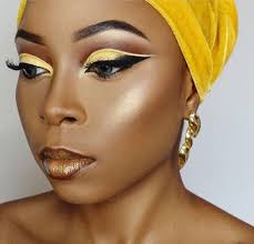 Black And Yellow Eyeshadow Looks Yellow Black Eye Look Makeup On Brown Skin Woman Of Color Brown Lipgloss Winged Eye Look Pin Brown Skin Makeup Makeup For Black Women Cleopatra Makeup