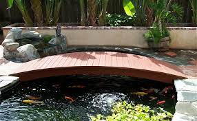 Paket pertama untuk infrastruktur jalan, jembatan, dan pagar belum semua rampung, tapi tahap pertamanya sudah selesai. 7 Inspirasi Kolam Ikan Depan Rumah Nggak Perlu Lahan Besar