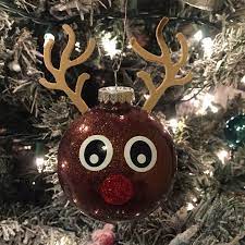 Reindeer Ornament Face Was Cutout Of Vinyl And The Antlers Out Of Craft Foam Vinyl Christmas Ornaments Handmade Christmas Ornaments Christmas Ornament Crafts