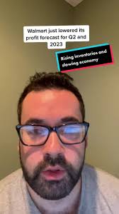 Walmart Lowers Earnings Forecast