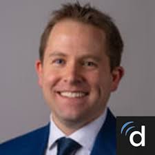 Dr. Travis J. Moss, MD