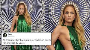The green versace dress jennifer lopez wore to the 2000. These Photos Of Jennifer Lopez Wearing Just A Cape Are Going Viral