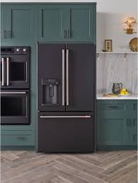 House Beautiful Remember Those Custom Coloured Appliances I Was Talking About Matte Black Yum Kitchen Appliance Trends Green Kitchen Designs Kitchen Trends