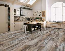 Linoleum is a resilient flooring material, meaning that it compresses and yet bounces back when walked on, giving it a slight cushioning effect. Wood Floors Plus Waterproof Click Together And Floating Rigid Core Vinyl Rustic Barnwood 1919 3 5 Mm 23 38 Sf Ctn