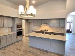 It is an emerald green with dark grey themed kitchen. Grey Themed New Kitchen Rassette Homes Grey Kitchen Cabinets Kitchen Island Lighting Grey Cabinets