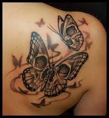 60 Best Butterfly Tattoos Meanings Ideas And Designs Skull Butterfly Tattoo Butterfly Tattoo Meaning Side Piece Tattoos