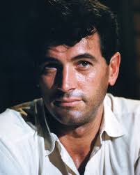 Rock Hudson in 'The Spiral Road' at Suriname in 1961. This photo really  portrays his looks. In Suriname, the heat was unbearable for filming. We  all stick our feet in the river