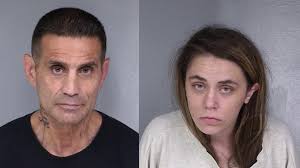 Two suspects arrested in stolen vehicle, drugs discovered after search