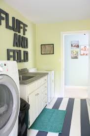Maybe you would like to learn more about one of these? Remodelaholic High Style Low Cost Laundry Room Makeover