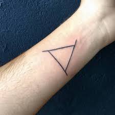 In a spiritual sense, a triangle tattoo can refer to the holy trinity. Meaning Of Triangle Tattoos Tattoo Blendup