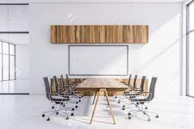 Find here conference tables, wooden conference table manufacturers, suppliers & exporters in india. Interior Of Modern Conference Room With White Walls Long Wooden Stock Photo Picture And Royalty Free Image Image 130264311