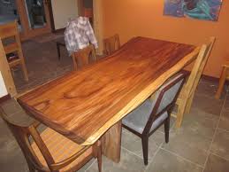 The edging is a natural cleft or rockface type finish giving it the rustic old stone world feel. Custom Made Acacia Slab Dining Table By Clean Air Woodworks Custommade Com