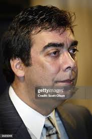 Liberterian Jerry Kohn talks to a spectator after announcing his... News  Photo