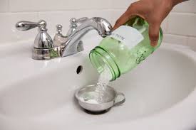 Pour vinegar into the drain pour one cup of distilled white vinegar into the drain. How To Clean A Clogged Drain With Baking Soda
