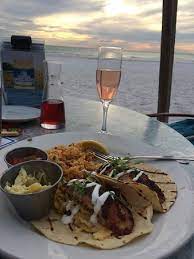 Maybe you would like to learn more about one of these? Yummy Fish Tacos Watching The Sunset And A Beautiful Wedding Beside Us On The Beach Picture Of Sandbar Restaurant Anna Maria Island Tripadvisor