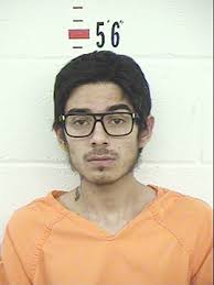 One suspect in custody, one sought following shooting at Grand and  University Two men have been charged in a shooting earlier this month that  sent a Las Vegas man to the hospital.