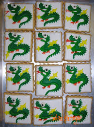 Dragon Cookies Dragon Cookies Cookies For Kids Sugar Cookies Decorated This set includes green dragons with red wings and number 1's.