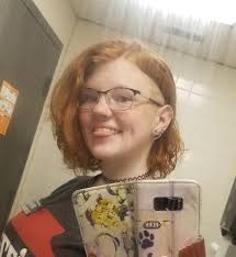 Young woman with down syndrome in school