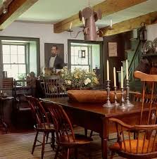 Farmhouse Interior Vintage Early American Farmhouse Showcases Raised Panel Walls Barn Wood Colonial Dining Room Colonial Home Decor Primitive Dining Rooms
