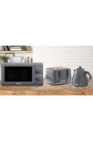 Comes with tea, coffee and sugar canisters. Daewoo Argyle 4 Slice Toaster Kettle And Microwave Set Studio