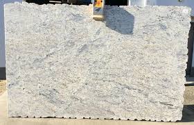 White ice granite is a features gold and whites with dramatic darker veins of chocolate and white ice granite can be processed into polished, sawn cut, sanded, rockfaced, sandblasted, tumbled. White Ice Granite Slabs