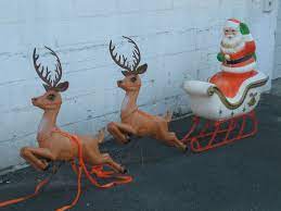 What kind of material is a reindeer sleigh made of? Vintage Poloron Blow Mold Blow Mold Christmas Xmas Cards Christmas Blow Molds