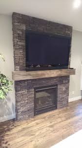 Wayne perfectly executed this project using our stratford stacked stone product to create an accent wall. Living Room Fireplace Featuring Stonecraft Stone Veneer The Cultured Stoners