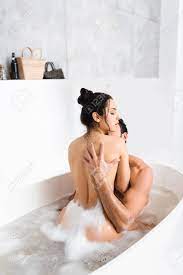 Man Touching Back Of Seductive Naked Woman While Taking Bath With Foam  Together Фотография, картинки, изображения и сток-фотография без роялти.  Image 141200699