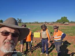 Quilpie teams at work and creative hat decoration