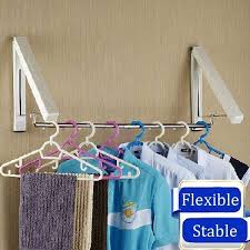 Sometimes it is a row of horizontal pegs, but sometimes it is more elaborate. Us 21 99 19 Off Creative Wall Mounted Retractable Foldable Clothes Rack Magic Hanger Storage Holder Home Decor From Home And Garden On Banggood Com Diy Clothes Hanger Storage Clothes Hanger Storage Diy Clothes