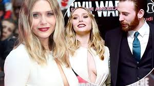 The internets will talk, and one of the things it's been talking about is the possible coupling of chris captain america evans and elizabeth the scarlet witch olsen. Chris Evans Caught Ogling Elizabeth Olsen S Breasts At The Captain America Civil War London Premiere Mirror Online