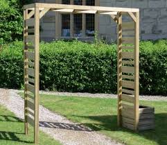A wooden or metal arch can create calming and inviting. Grange Urban Garden Arch Garden Arches Garden Archway Garden Arch