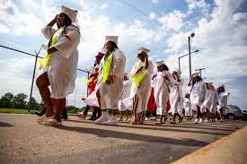 Beecher High School seniors celebrate graduation in-person at outdoor  ceremony