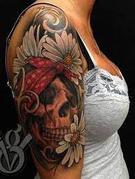 The combination of skull and rose makes a contrast between life and death. 38 Cool Sugar Skull Tattoos Elbow Tattoos Sleeve Tattoos For Women Arm Sleeve Tattoos