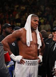 Anthony joshua has a lion and a forest tattooed onto his middle finger to cover up calluses he has picked up during his boxing career. Anthony Joshua Tattoos What Ink Does Aj Have And What Do They Mean